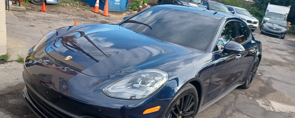 Blue Porsche outside the Andres Graphics Philly shop