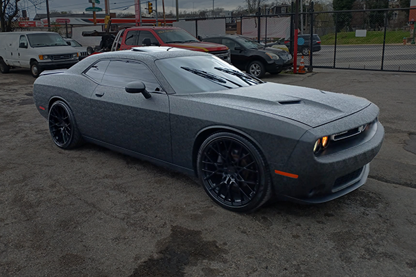 Gray Dodge Challenger with a custom matte vehicle wrap